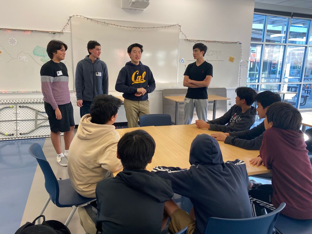 CCA Speech & Debate Team tutors Danny An, Alex Tahan, President Justin Liu and Andrew Peng