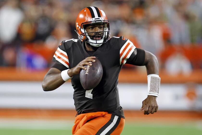 Cleveland Browns quarterback Jacoby Brissett scrambles for a short gain during the second half of an NFL football game against the Pittsburgh Steelers in Cleveland, Thursday, Sept. 22, 2022. (AP Photo/Ron Schwane)