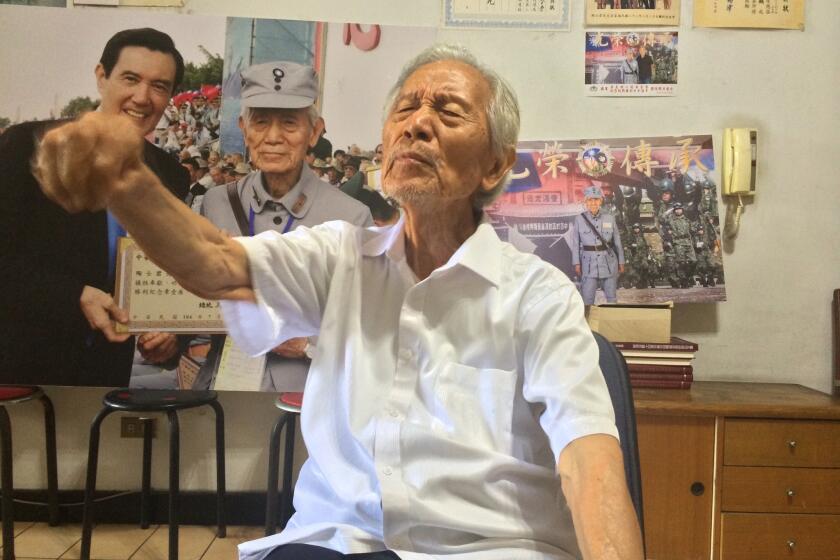 Maj. Tao Shin-jun, 97, served with Chiang Kai-shek's Nationalist forces in mainland China in the 1940s. The walls of his apartment in Taipei are decorated with commendations for his war service.