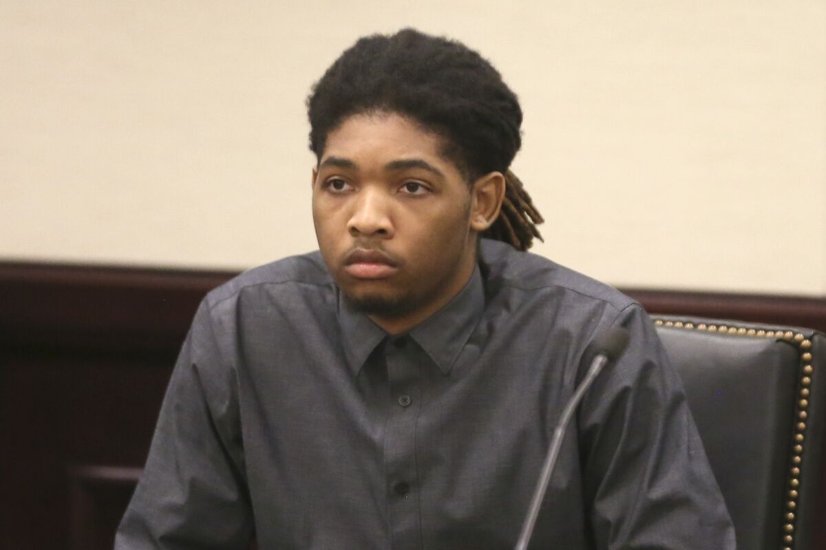 Isimemen Etute appears in court in Christiansburg Va. Thursday May 19 2022. Etute, a Virginia Tech freshman linebacker is charged in the fatal beating of a Tinder match. (Matt Gentry/The Roanoke Times via AP, Pool)