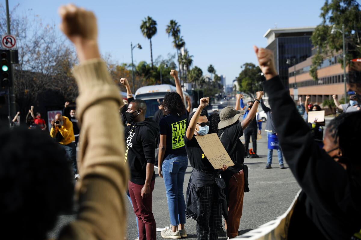 Demonstrators stop traffic near Garcetti's home on Monday, the seventh consecutive day of protests there.