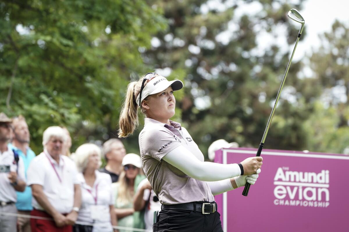 Brooke Henderson follows her ball after playing on the second hole during the Evian Championship on July 23, 2022.
