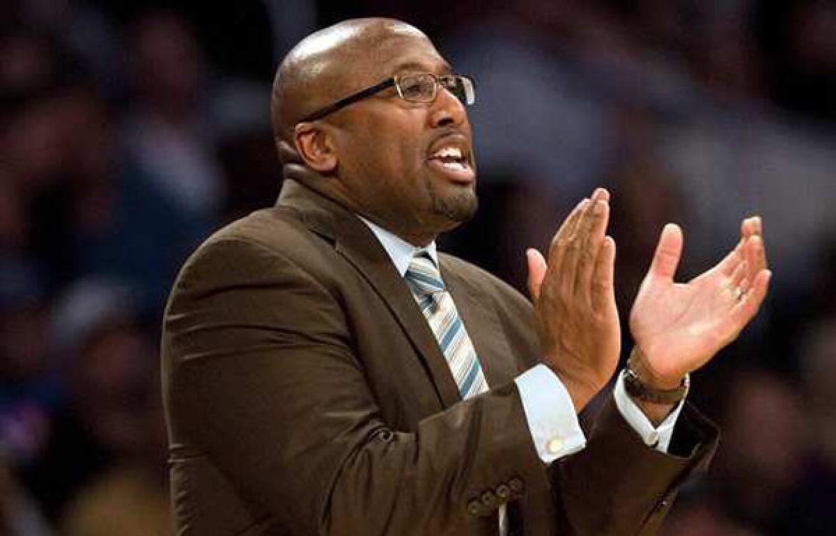 Former Lakers coach Mike Brown during a game last season at Staples Center.