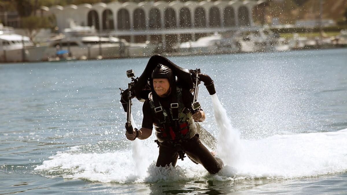 Times columnist Chris Erskine uses a jet pack in Newport Beach in June 2012.