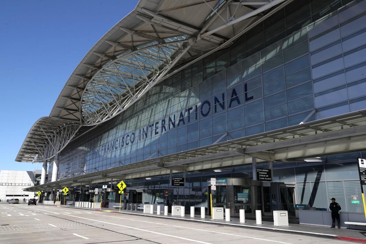 SAN FRANCISCO, CA - APRIL 02: The road in front of the international terminal sits empty at San Francisco International Airport on April 02, 2020 in San Francisco, California. Due to a reduction of flights and people traveling, San Francisco International Airport has consolidated all of its terminals into one concourse in the international terminal. (Photo by Justin Sullivan/Getty Images)
