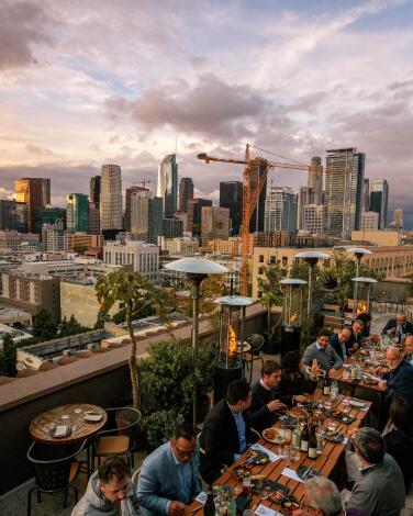Los Angeles , CA - May 04 A view of the Cara Cara Rooftop Bar, long and dining area showing a view of the Los Angeles Downtown City Skyline. (Brian van der Brug / Los Angeles Times)