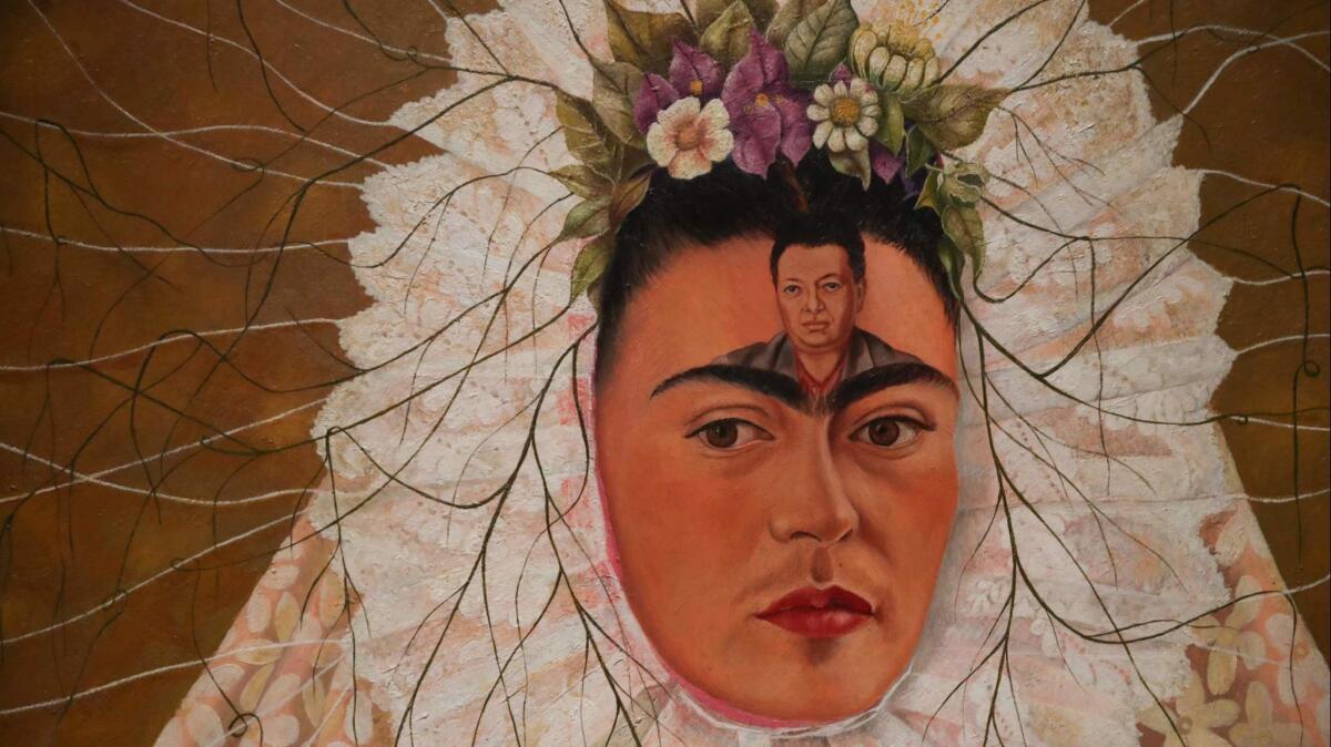 A detail of Frida Kahlo's "Self-Portrait as a Tehuana" (1943) on display at the Victoria & Albert Museum in London.