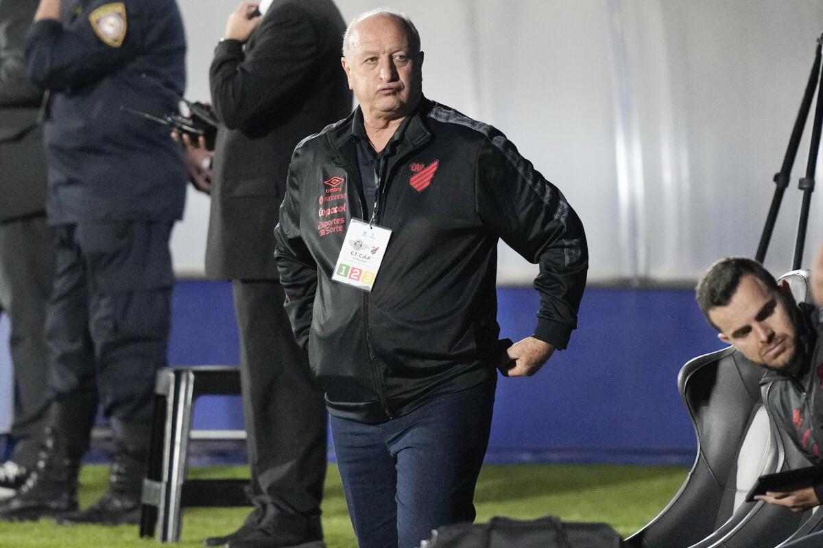FILE - Brazil's Athletico Paranaense coach Luiz Felipe Scolari watches from the sidelines during a Copa Libertadores Group G soccer match, in Asuncion, Paraguay, May 4, 2023. Scolari came out of retirement on Friday, June 16, 2023, to take charge of Atletico Mineiro. (AP Photo/Jorge Saenz, File)