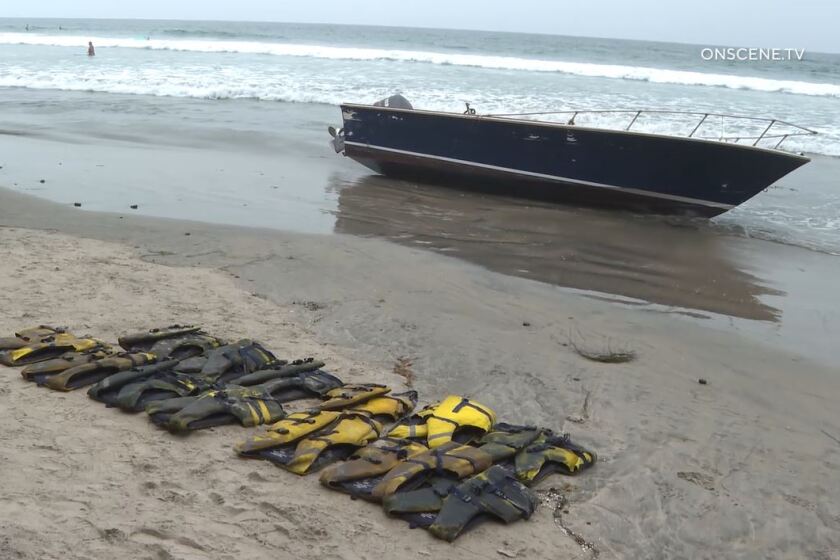 The Border Patrol says this panga boat was beached then abandoned at Stonesteps Beach in Encinitas on Monday, Aug. 24. Several people were seen running from the boat. In front of the boat lay 13 lifejackets left behind.
