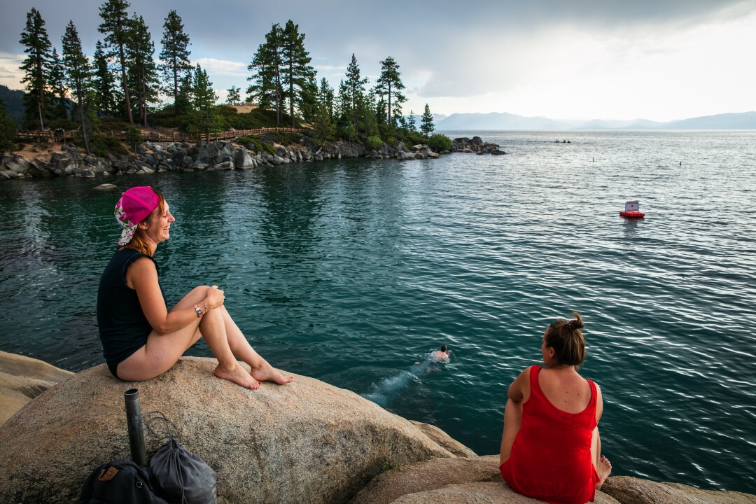 Severine Durand, left, and Charlotte Trudelle enjoy Lake Tahoe at Sand Harbor, Nev.
