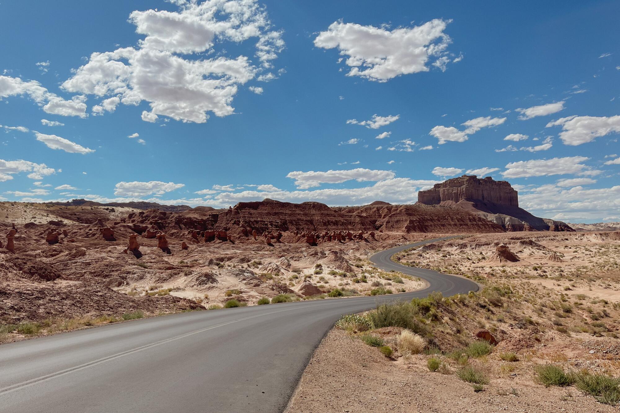 Can you spot the goblins along Goblin Valley Road in Goblin Valley State Park?