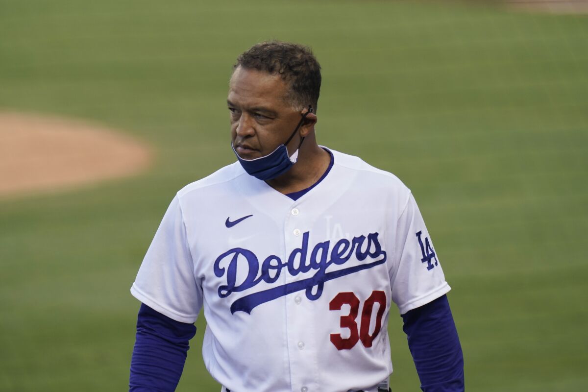 Dodgers manager Dave Roberts is shown against the San Diego Padres on Aug. 13, 2020.