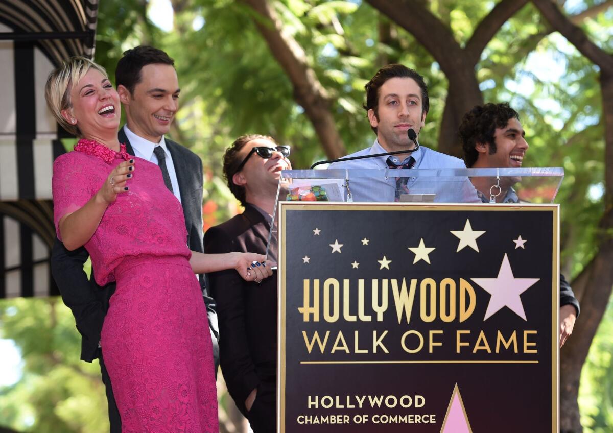 Remarks by Simon Helberg crack up "Big Bang Theory" castmates Kaley Cuoco, left, Jim Parsons, Johnny Galecki and Kunal Nayyar during the unveiling ceremony for Cuoco's star on the Hollywood Walk of Fame.