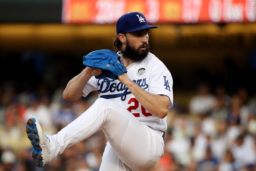 Dodgers starter Tony Gonsolin delivrs a pitch against the Mets in the first inning of Thursday night's game, June 2, 2022