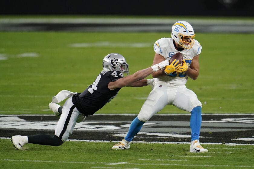 Los Angeles Chargers tight end Hunter Henry #86 catches a pass during the first quarter against the Las Vegas Raiders in an NFL football game, Sunday, Dec. 13, 2020, in Las Vegas. (AP Photo/Jeff Bottari)