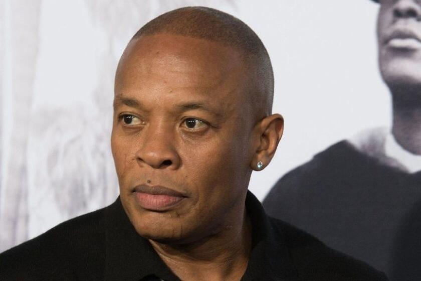 (FILES) This file photo taken on August 10, 2015 shows record producer Dr Dre arriving for the premiere of "Straight Outta Compton" in Los Angeles, California. A South Korean man has been fined for spreading rumours online that the 94-year-old widow of late president Kim Dae-Jung, was to marry US hip-hop legend Dr Dre, reports said on August 28, 2017. / AFP PHOTO / Valerie MACONVALERIE MACON/AFP/Getty Images ** OUTS - ELSENT, FPG, CM - OUTS * NM, PH, VA if sourced by CT, LA or MoD **