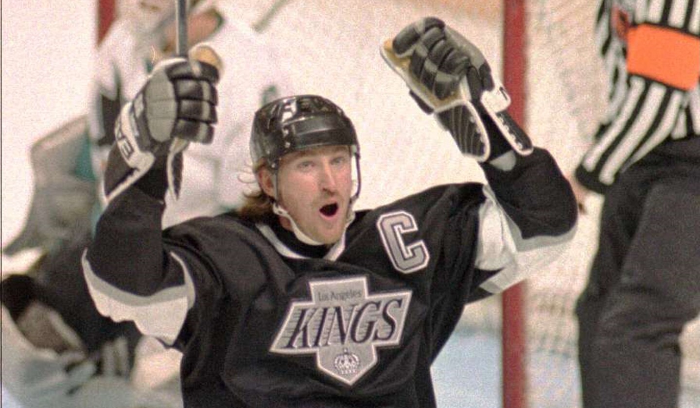 Wayne Gretzky celebrates after scoring a goal for the Kings in 1994.