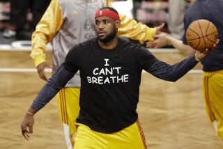 FILE - In this Dec. 8, 2014 file photo, Cleveland Cavaliers' LeBron James wears a T-shirt reading "I Can't Breathe," during warms up before an NBA basketball game against the Brooklyn Nets in New York. Celebrities have long played a significant role in social change, from Harry Belafonte marching for civil rights to Muhammad Ali’s anti-war activism. James and other basketball stars made news in 2014 when they wore T-shirts to protest the death of Eric Garner. (AP Photo/Frank Franklin II, File)