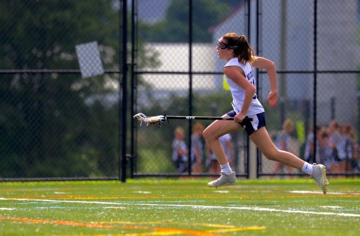 The Bishop's School student and lacrosse player Kate McCool in action.