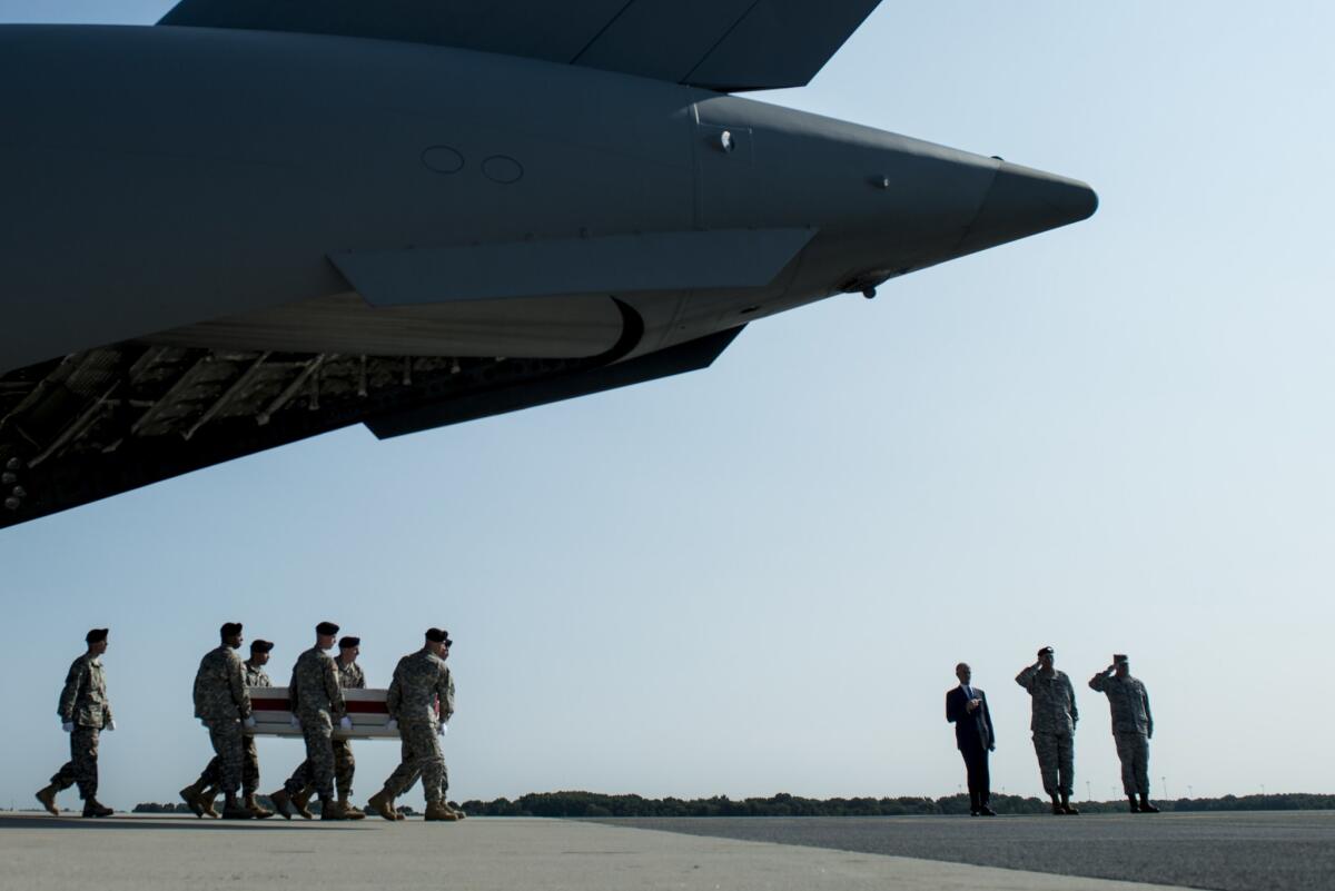 The body of Army Maj. Gen. Harold J. Greene arrives at Dover Air Force Base in Delaware on Aug. 7.