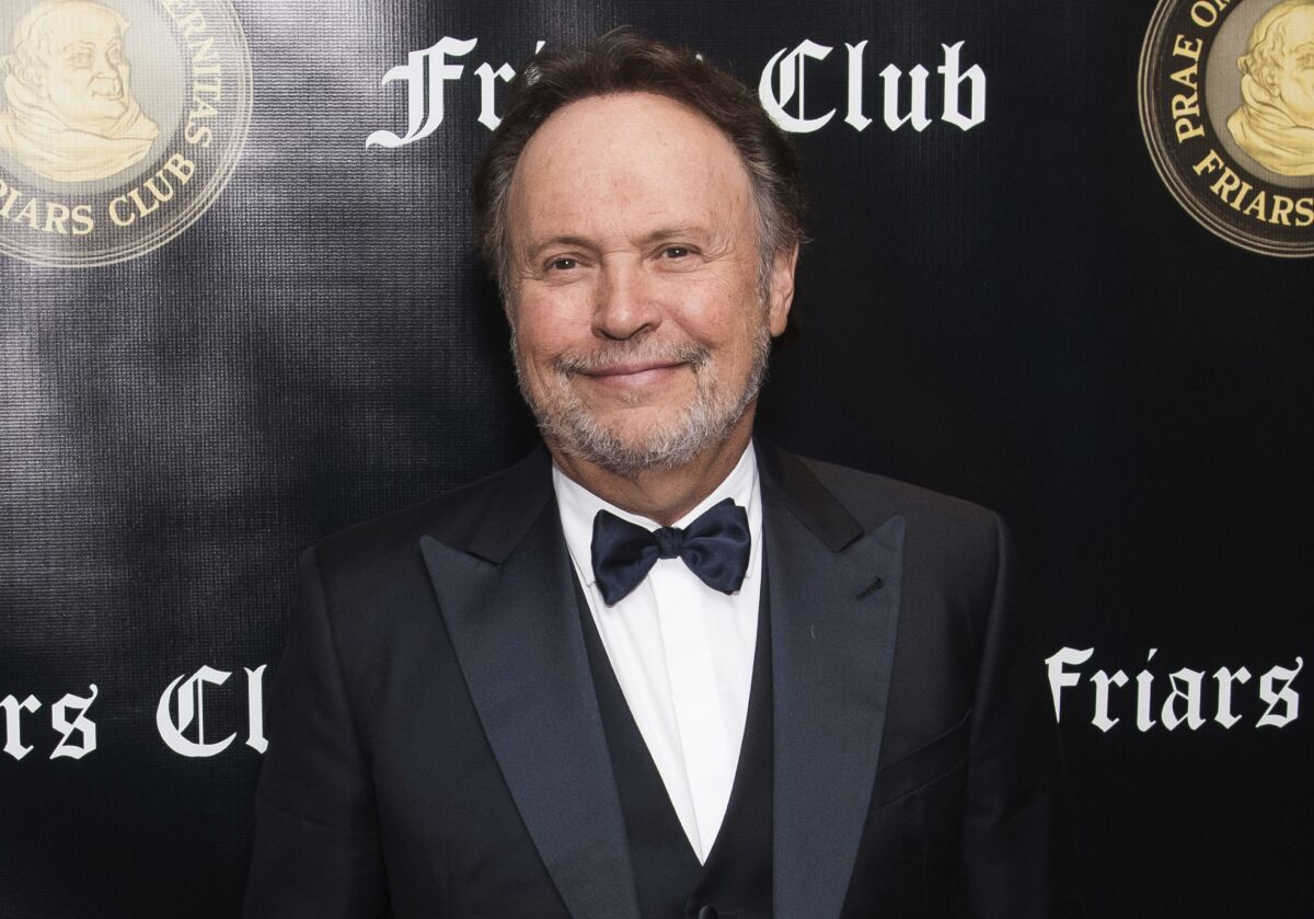 FILE - Billy Crystal appears at the Friars Club Entertainment Icon Award ceremony on Nov. 12, 2018, in New York. The comic icon has turned his comedy film “Mr. Saturday Night' into a Broadway-bound musical and hopes to open it next year with him reprising his film role as Buddy Young Jr., a bitter old insult comic chasing a last laugh. (Photo by Charles Sykes/Invision/AP, File)