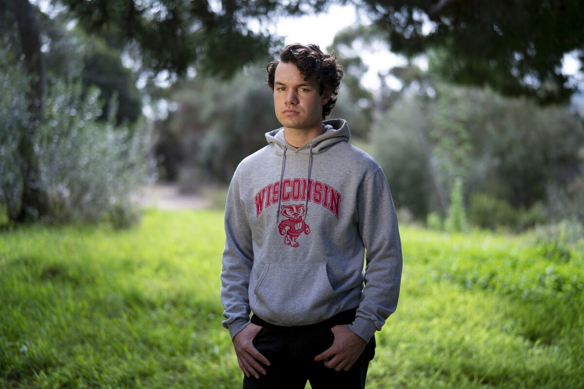 Bryce Neels, a student at the University of Wisconsin-Madison, stands at Presidio Park in San Diego. 