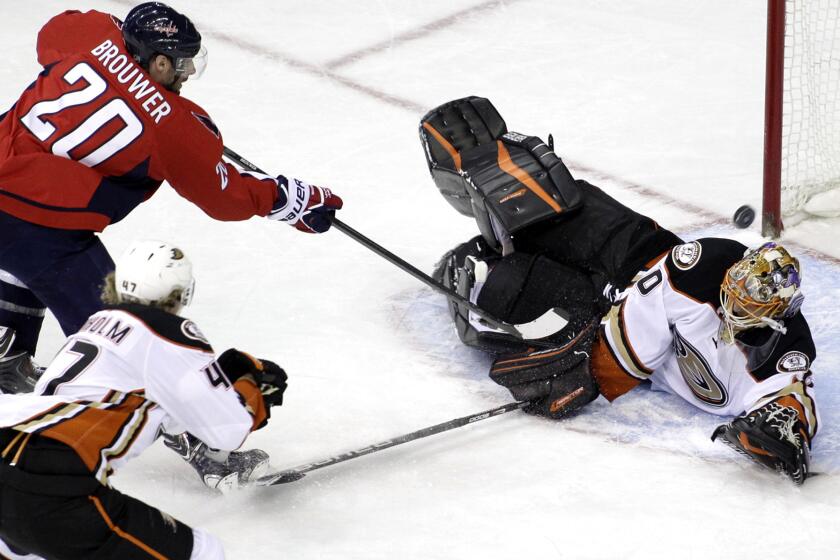 Ducks goalie Ilya Bryzgalov blocks a shot by Capitals right wing Troy Brouwer in the second period Friday.