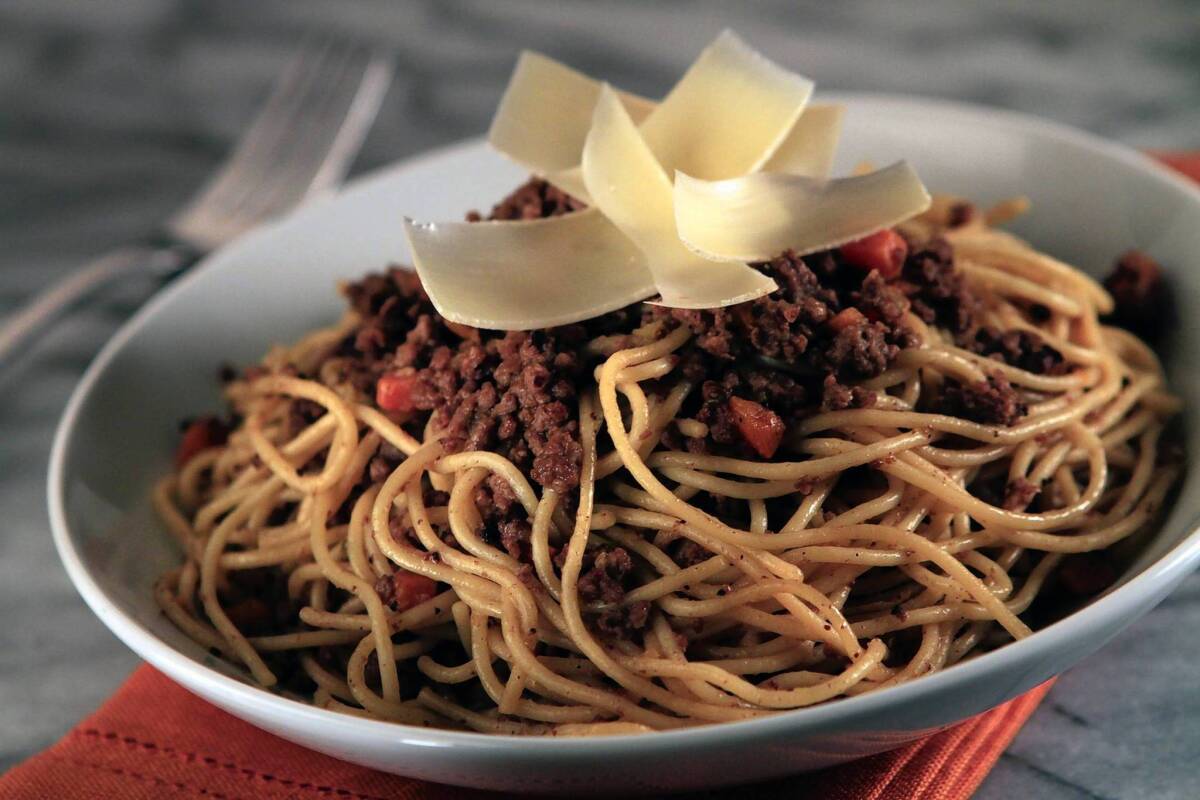 Spaghetti Bolognese from Cafe Pierre in Manhattan Beach is rich with beef, garlic and herbs.