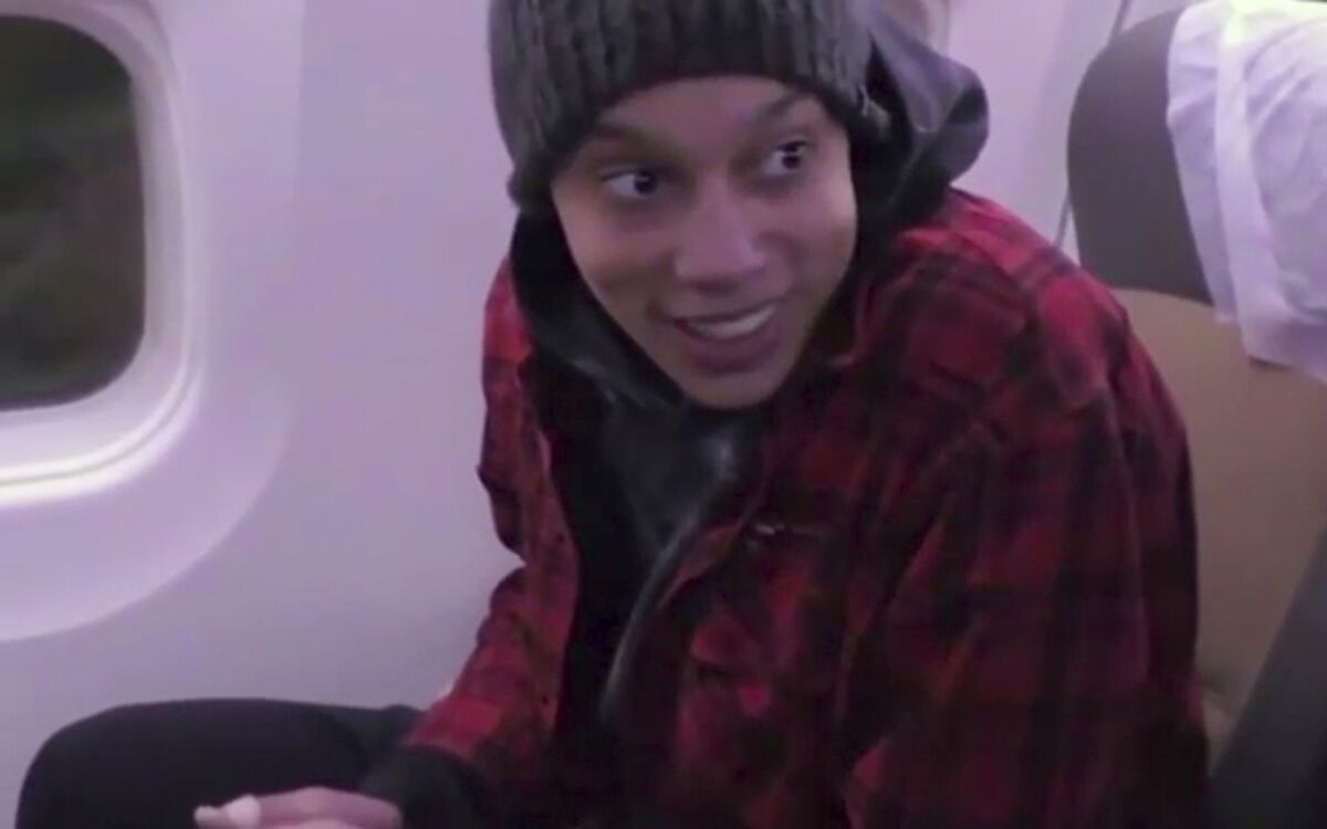 WNBA star and two-time Olympic gold medalist Brittney Griner sits in the plane as she flies to Abu Dhabi.