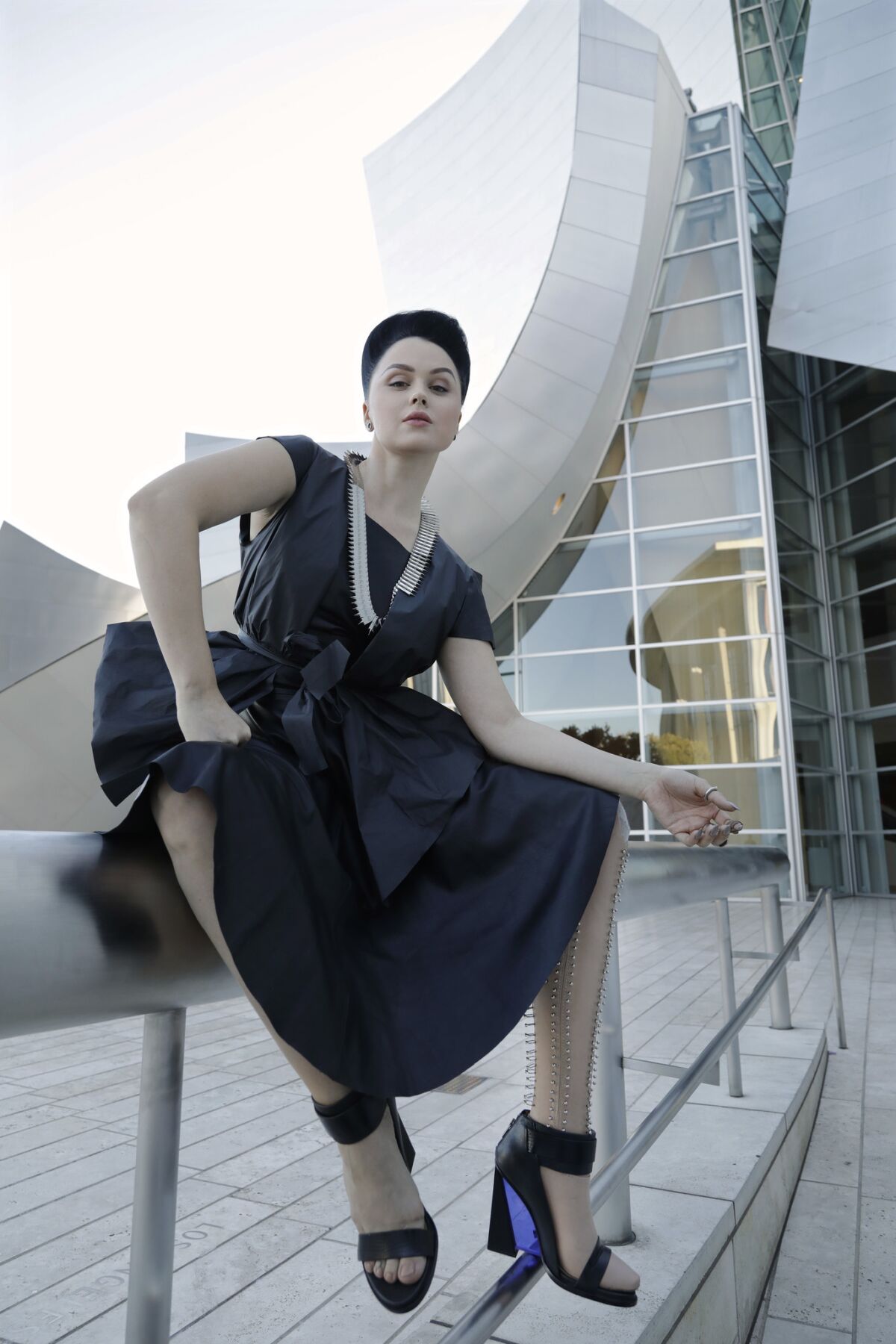 Viktoria Modesta poses in front of Walt Disney Concert Hall in downtown Los Angeles. She says the setting is apt since she spent a lot of time watching Disney films as a child while recovering from her many reconstructive surgeries.