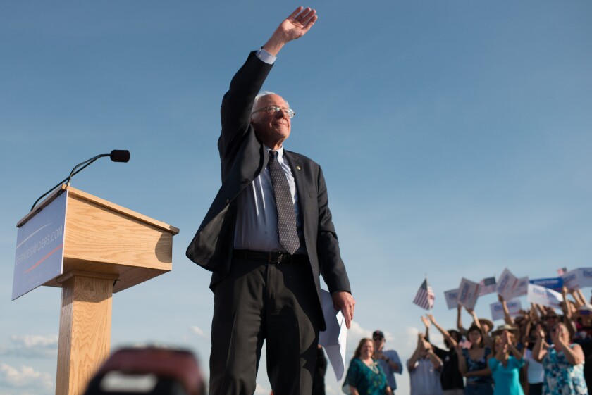 Sen. Bernie Sanders waves to the crowd on Tuesday in Burlington, Vt., after formally announcing he will seek the Democratic nomination for president.