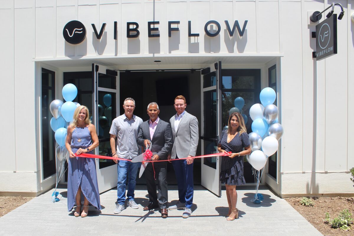 Lori Cavallo, Brian Ahern, Billy Borja, Chris Wilke and Lisa Borja at the ribbon cutting with the San Diego Coastal Chamber of Commerce on July 26.