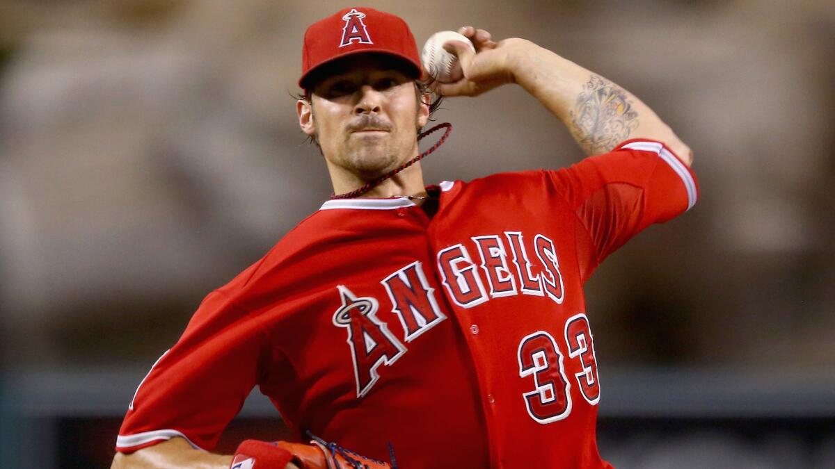 C.J. Wilson allowed one hit in seven shutout innings for the Angels in a 5-0 victory over the Seattle Mariners.