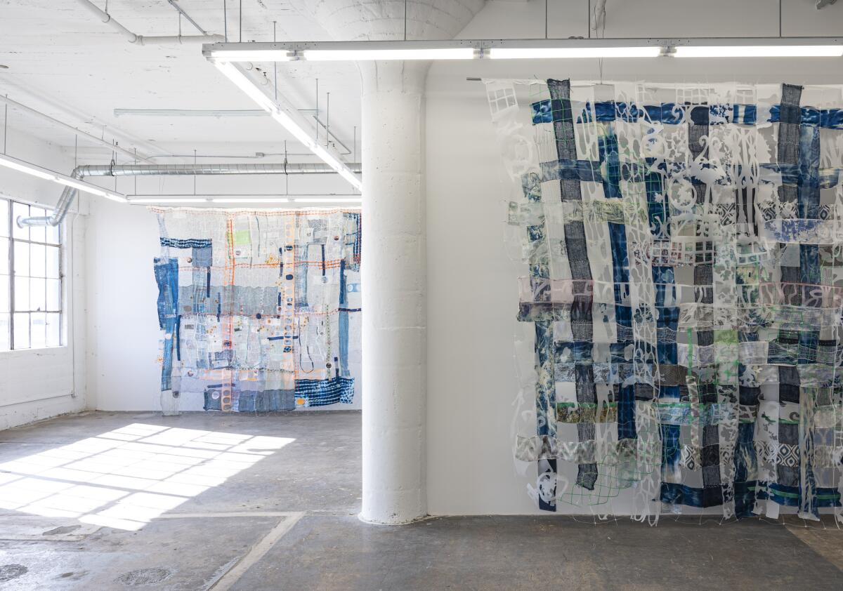 "Henri's Open Fortress," foreground, and "Aperture" by Fran Siegel at Wilding Cran in downtown Los Angeles. The show was supposed to open March 21.