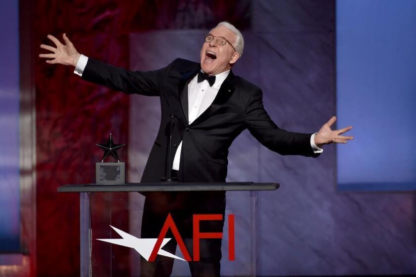 Steve Martin embraced the AFI Life Achievement Award he received Thursday evening at the Dolby Theatre