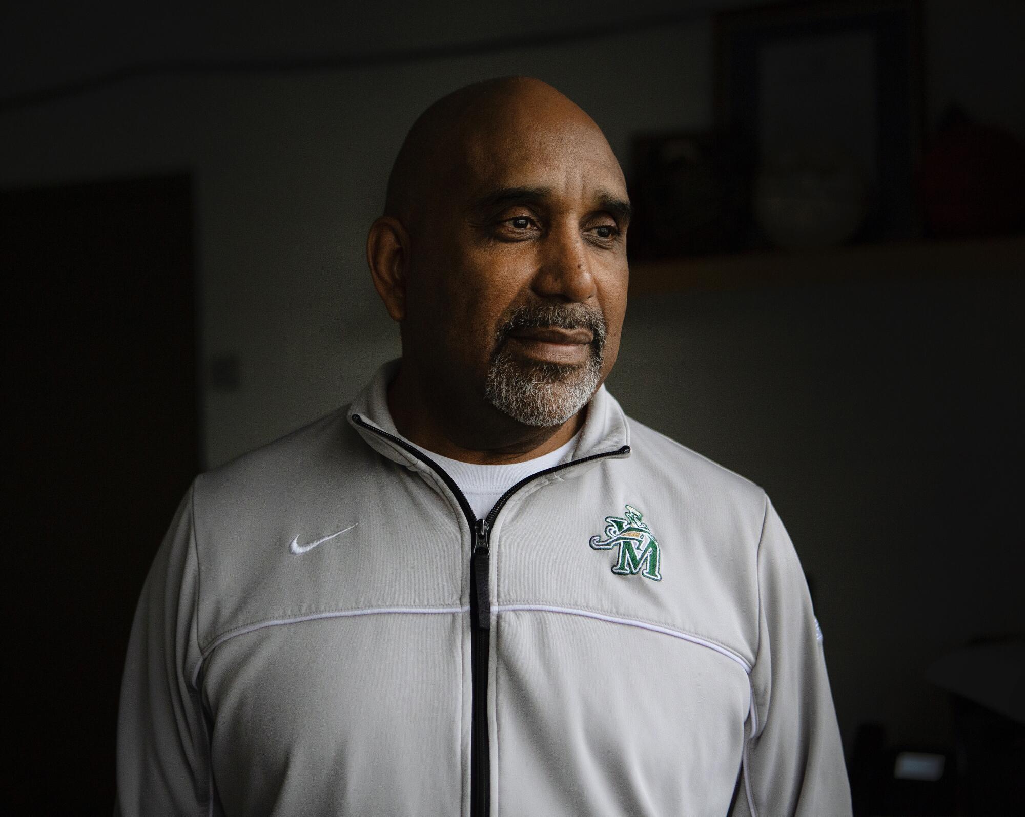 St. Vincent-St. Mary High boys' basketball coach Dru Joyce II poses for a photo.