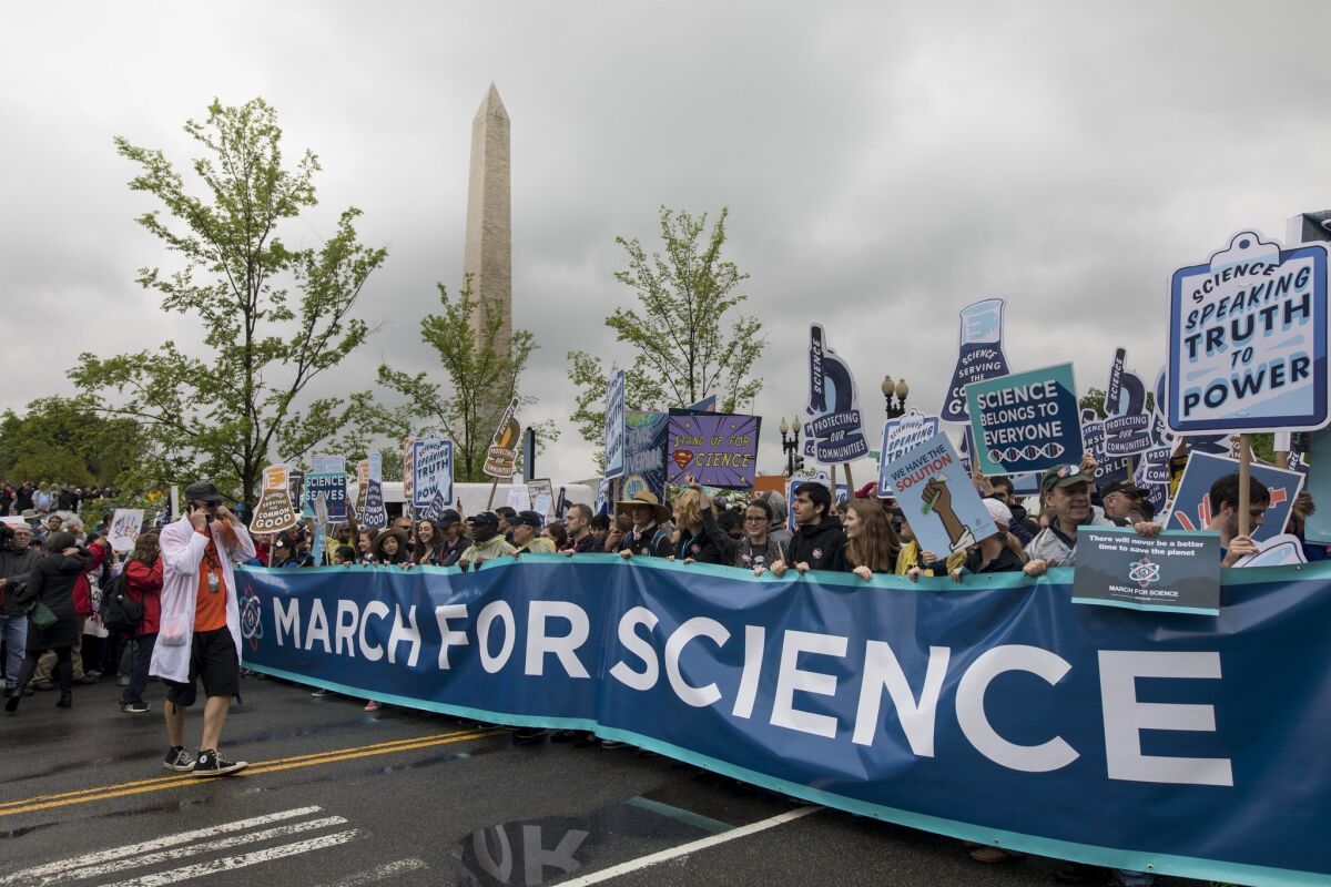 Tens of thousands of protesters walk along Constitution Avenue during the March for Science in Washington, D.C., on April 22. They were joined by hundreds of thousands of others in more than 400 locations around the world.