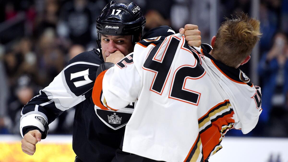 Left wing Milan Lucic, squaring off with Ducks defenseman Josh Manson, will have to bring a scoring touch as well as his toughness to help the Kings this season.