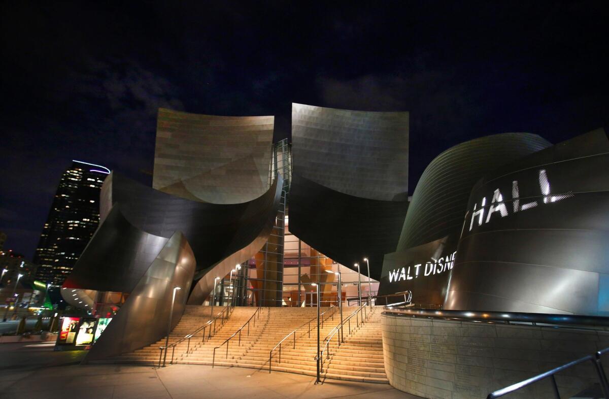The exterior of the Walt Disney Concert Hall at night.