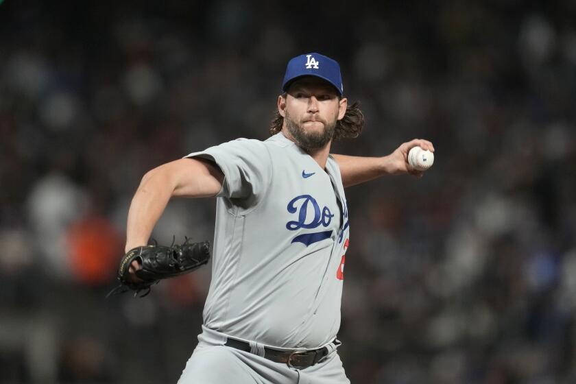 Los Angeles Dodgers pitcher Clayton Kershaw works against the San Francisco Giants during the sixth inning of a baseball game in San Francisco, Saturday, Sept. 30, 2023. (AP Photo/Jeff Chiu)