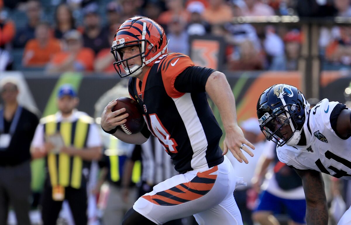 Cincinnati Bengals quarterback Andy Dalton runs with the ball against the Jacksonville Jaguars on Oct. 20.