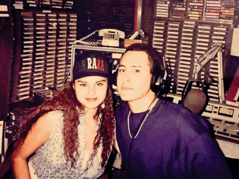 Oscar Gomez poses in the radio studio at KDVS at UC Davis in 1992 with his friend Natalie Paredes.  