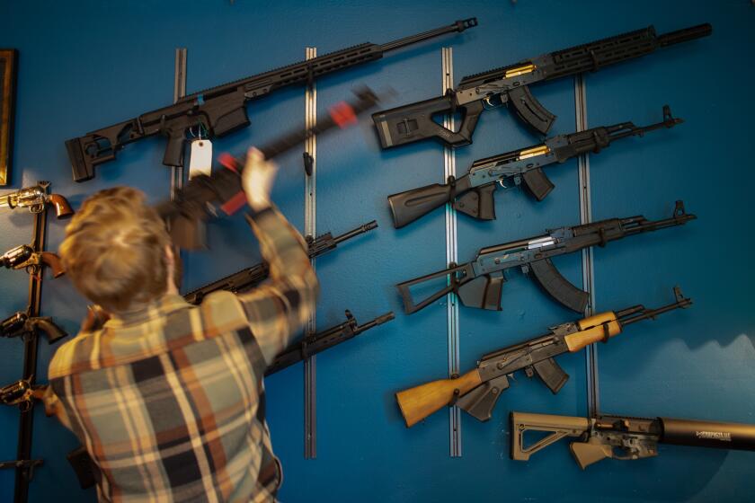 CARSON, CA - JANUARY 18: Jack Brandhorst is the owner of Red Rifle Ltd., a boutique gun store in Carson. A debate took place in Torrance over whether the store was able to open in the city. Eventually, his permit was denied. Photographed on Wednesday, Jan. 18, 2023 in Carson, CA. (Myung J. Chun / Los Angeles Times)