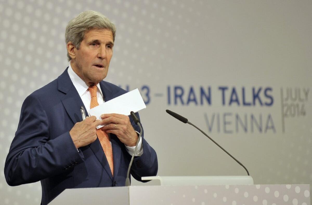 U.S. Secretary of State John Kerry addresses the media Tuesday following his latest talks between the E3+3 and Iran on Iran's nuclear program.