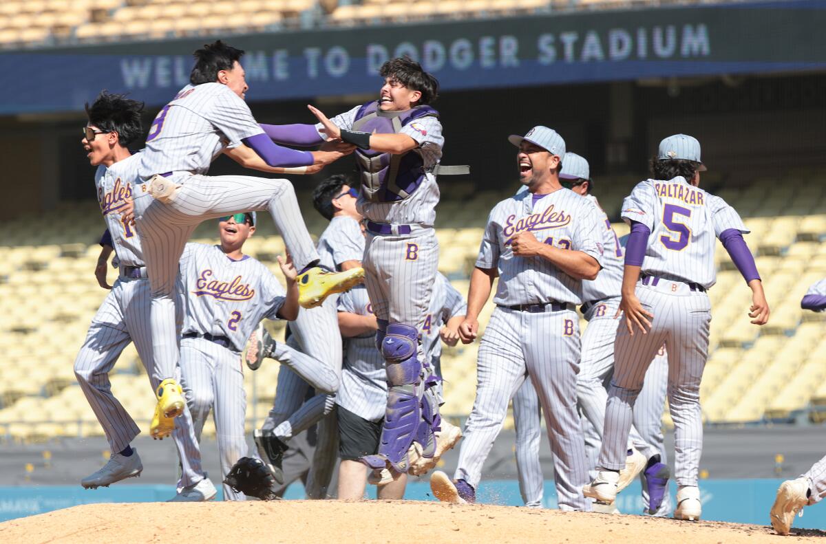 Bell celebrates after defeating Birmingham in the City Section Open Division championship at Dodger Stadium Saturday. 