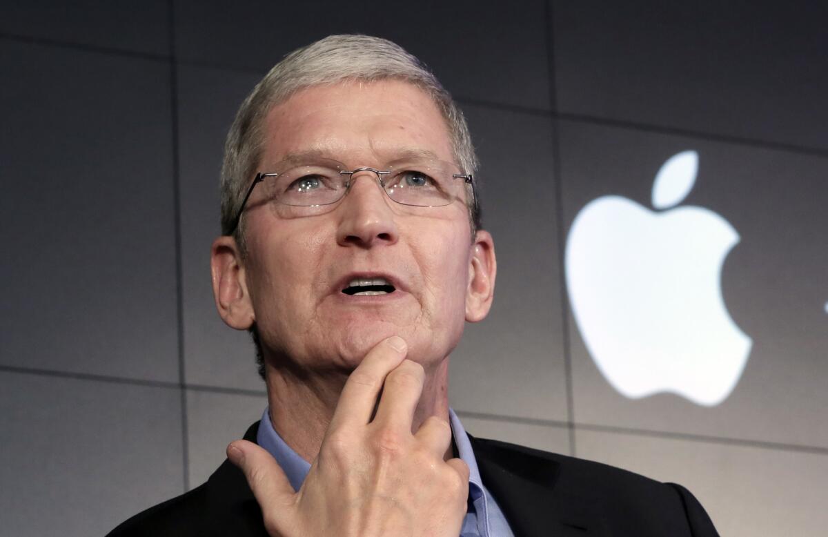 Apple Chief Executive Tim Cook. At the company's annual shareholders meeting, Cook acknowledged the spread of coronavirus is putting pressure on its operations.