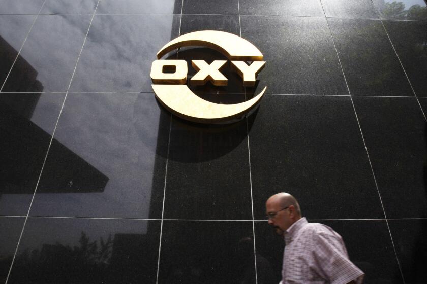 Occidental Petroleum said third-quarter earnings jumped by more than 14%.
