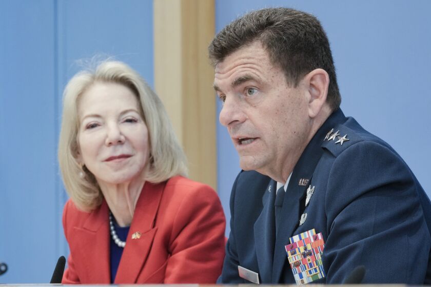 United States Ambassador to Germany Amy Gutmann, left, and U.S. Air National Guard Director Lieutenant General Michael A. Loh, brief the media during a news conference on the Air Defender military exercise in Berlin, Germany, Wednesday, June 7, 2023. (AP Photo/Markus Schreiber)