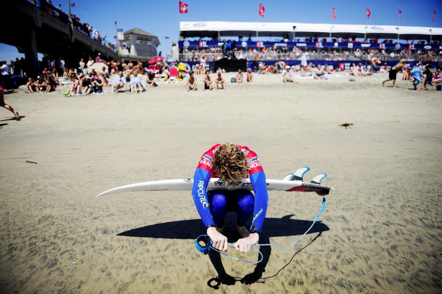 U.S. surfer Taylor Clark limbers up