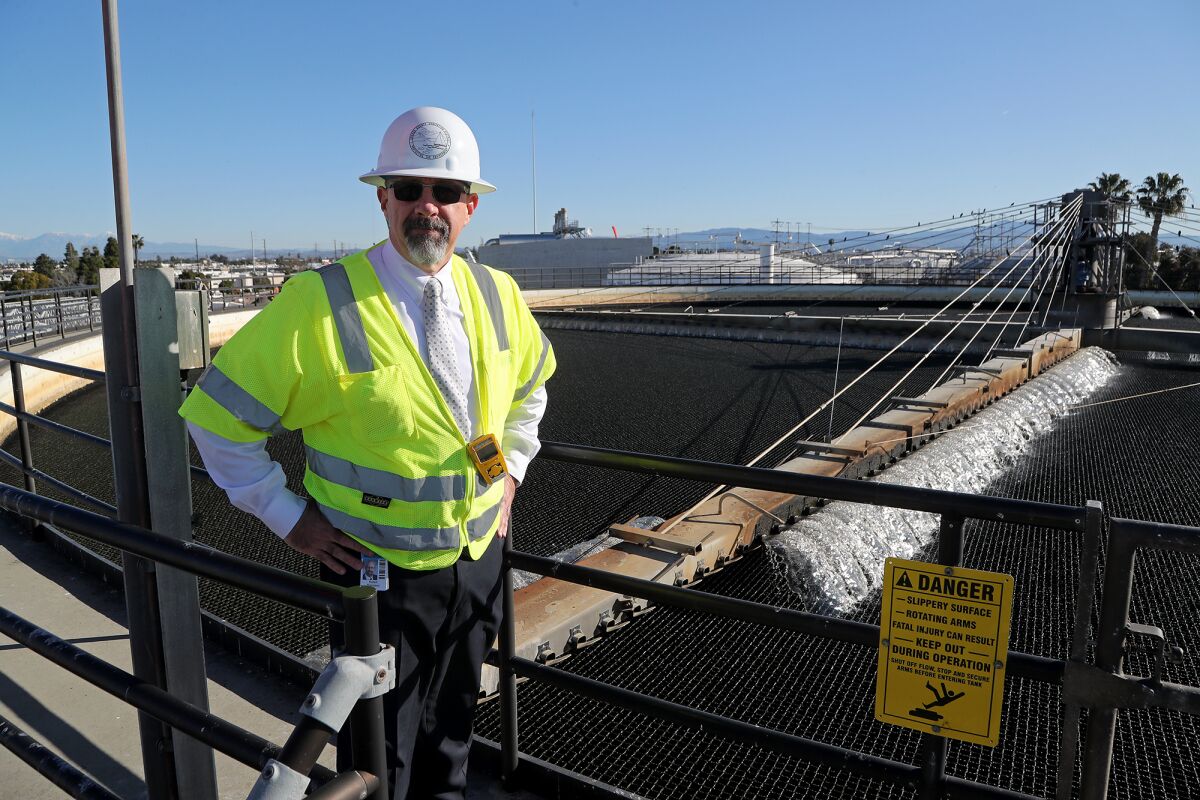 Assistant General Manager Rob Thompson at a trickling filter at the Sanitation District's Fountain Valley site.